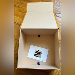 Louis Vuitton medium square box and dust bag.